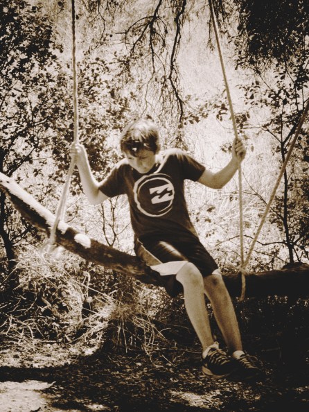 Little G in the valley on a makeshift log swing. 